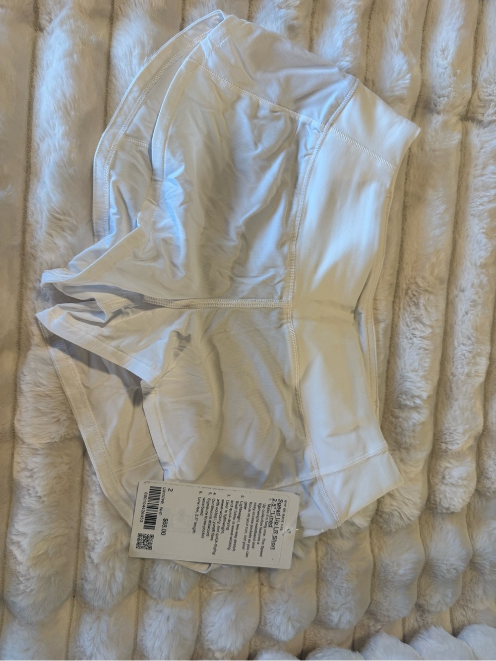 AUTHENTIC LULULEMON. New with tags. White speed up shorts. Size 2. 2.5” inseam.